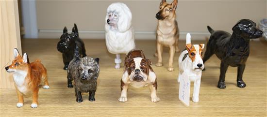 Six Royal Doulton dogs - a poodle, bulldog HN1047 and four others